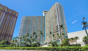 A high-rise hotel with multiple floors, a central atrium, and a modern architectural design.