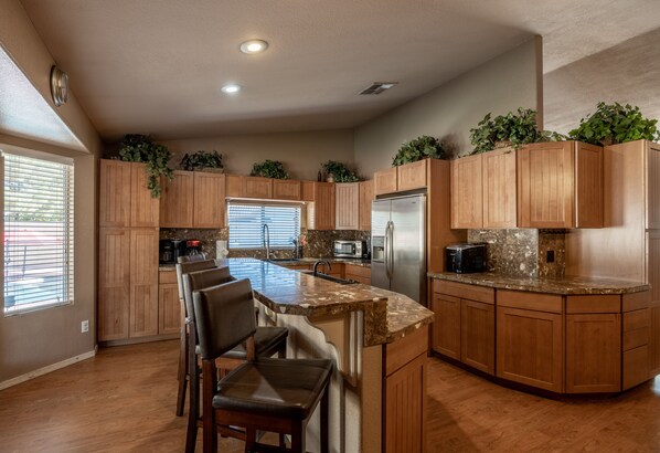 Fridge, microwave, oven, stovetop - Family Fun Getaway.  Sleeps up to 18, heated pool, basketball court. (Peoria)