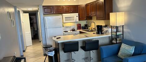 Coffee/tea maker, fridge, microwave, oven