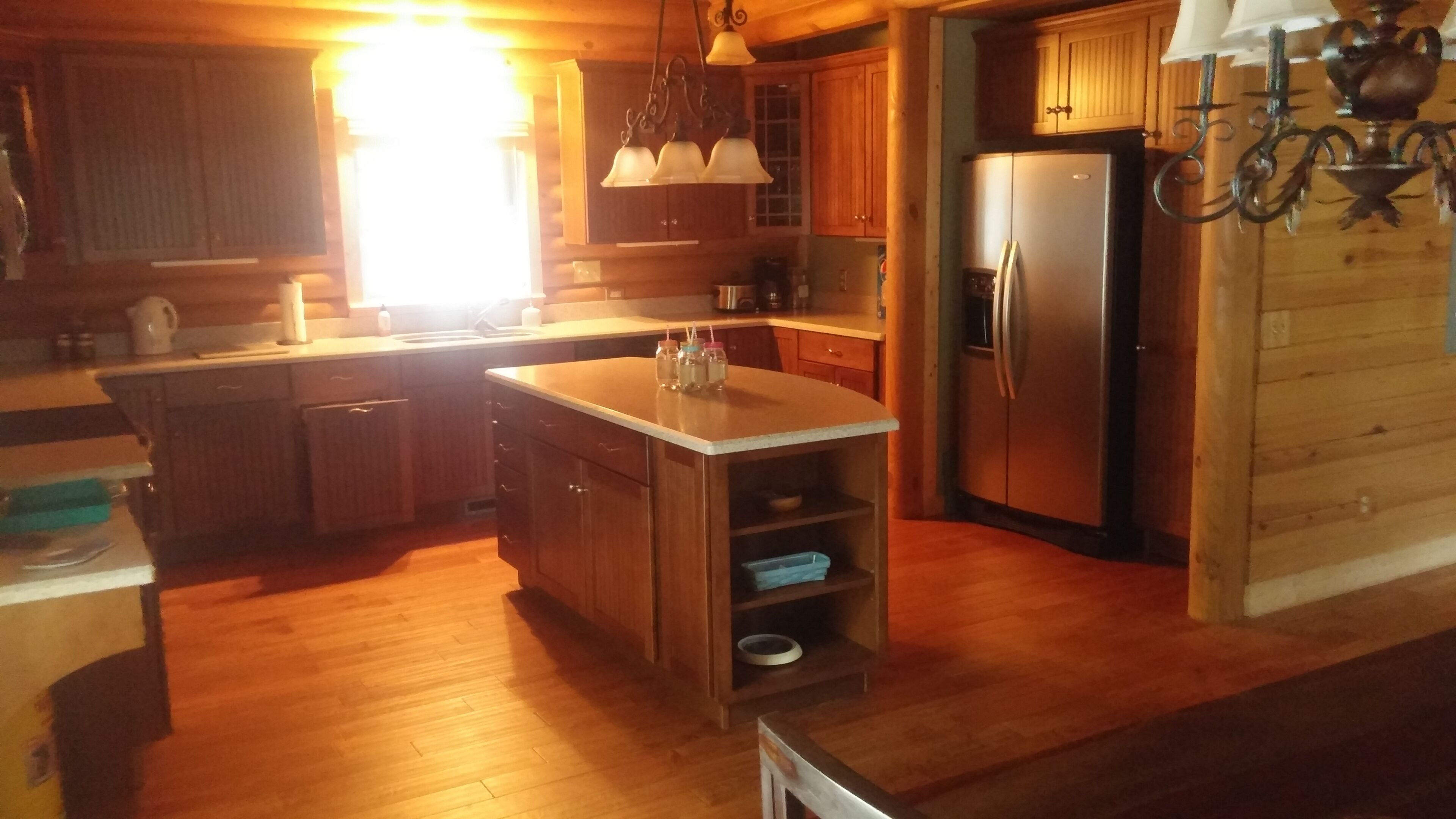 Gorgeous lakefront log home on secluded cove with private beach and boat dock