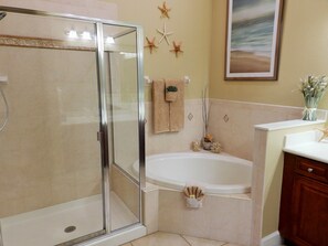 Combined shower/tub, hair dryer, towels, soap