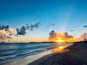 On the beach, sun-loungers, beach towels