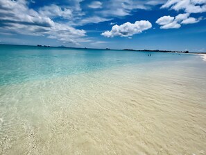 On the beach, sun-loungers, beach towels
