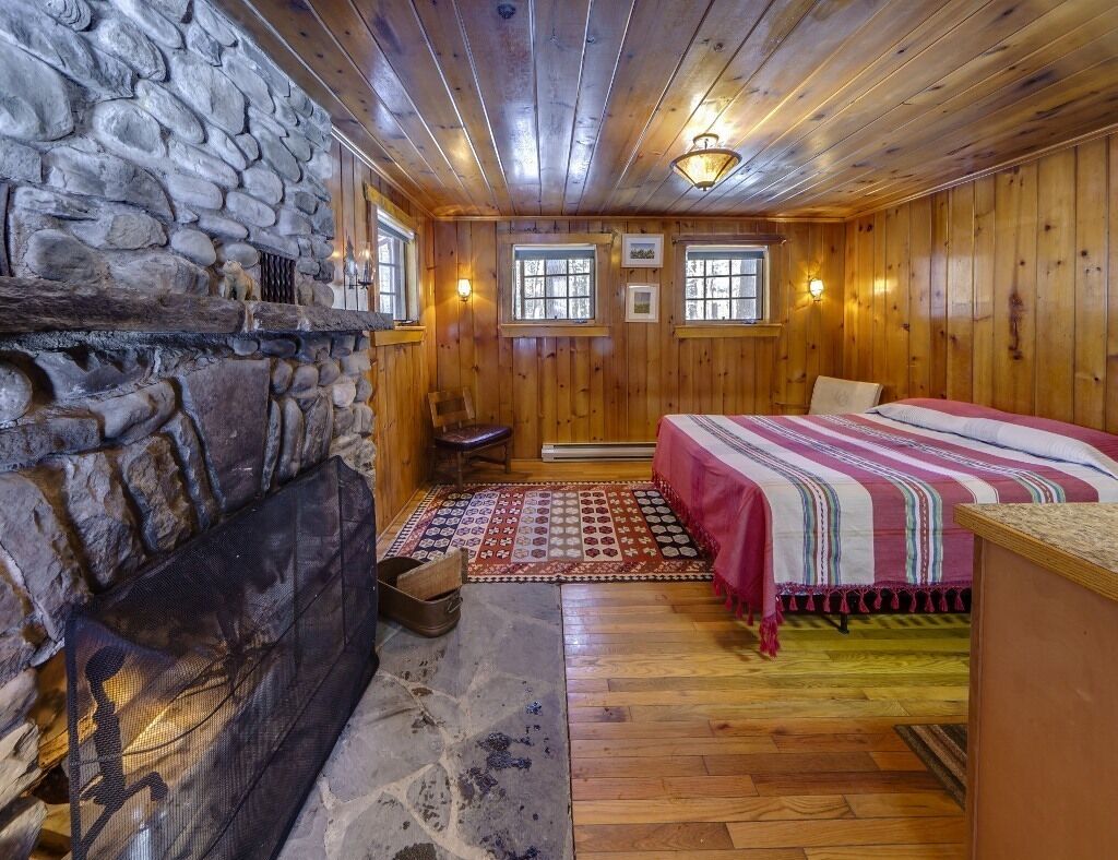 Isolated Knotty Pine Charming Cabin w/Stone Fireplace on 575 Acre Preserve