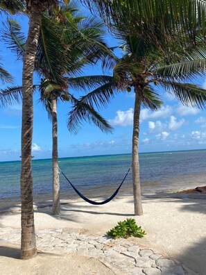 On the beach, sun loungers, beach towels