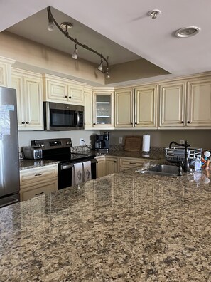 Fridge, microwave, dishwasher, coffee/tea maker