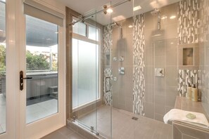 Combined shower/tub, hair dryer, towels, soap
