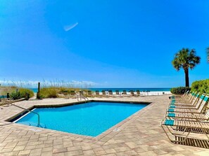 Relax by the pool and enjoy the view from one of the lounge chairs.