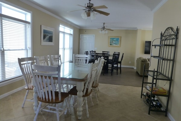 2 dining tables that seat 16