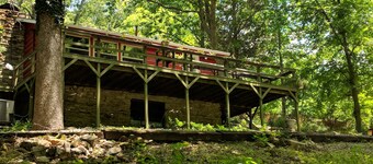 Our creekside cabin is nestled deep in the country on a secluded lane.
