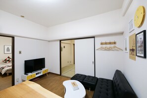 Signature Apartment, Multiple Beds (10) | Living area | Flat-screen TV - 73BNB Hotel Apartment Ebisucho (Osaka)