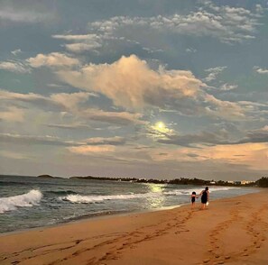 Walking along the beach, guests can enjoy the calm ocean and well-maintained shoreline.