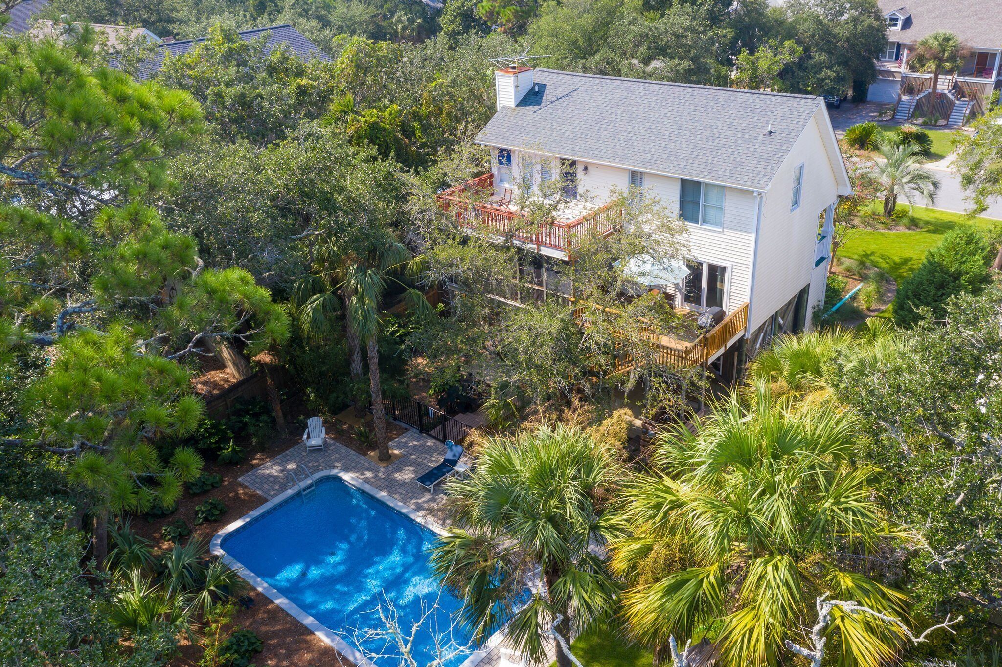 Private Oasis with Pool Close to Everything Screened Porch and Deck Open Concept