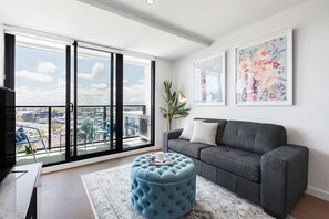 Living area - Ilixir Apartments by Ready Set Host (Cheltenham)