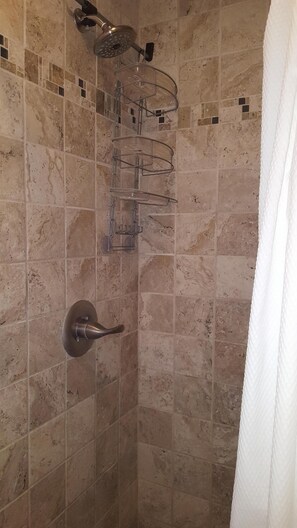 Shower, towels, toilet paper