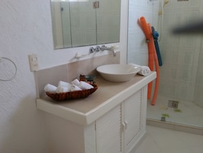 Shower, towels, soap, toilet paper