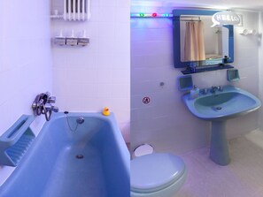 Combined shower/tub, hair dryer, bidet, towels