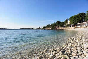 Beach nearby, sun loungers