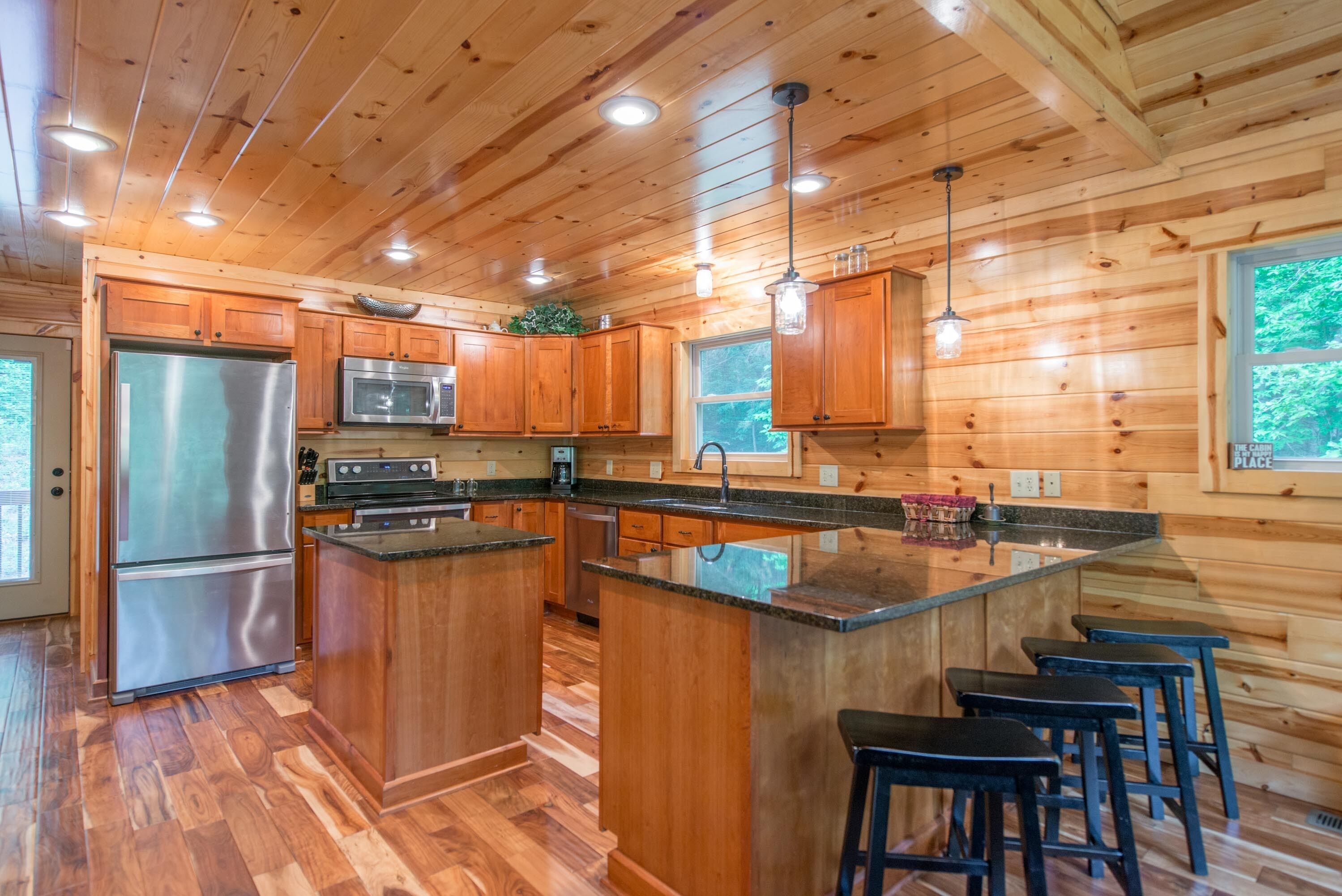 Gorgeous pet friendly property with 3 BR/3 BA cabin, multipule private acres, and a pond