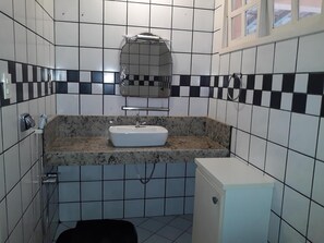 Shower, hair dryer, towels, toilet paper