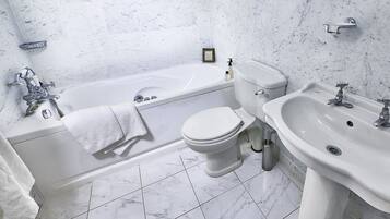 Combined shower/tub, jetted tub, hair dryer, towels