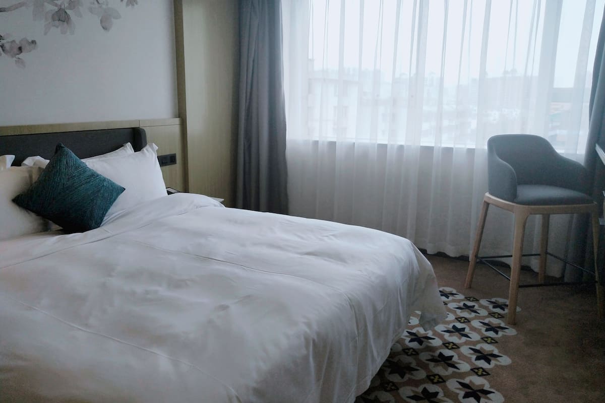 Deluxe Double Room | In-room safe, desk, blackout drapes, iron/ironing board