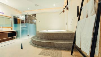 Romantic Room, 1 King Bed, Non Smoking | Bathroom | Separate tub and shower, jetted tub, hydromassage showerhead