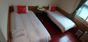 Twin Room | Desk, blackout drapes, free WiFi, bed sheets