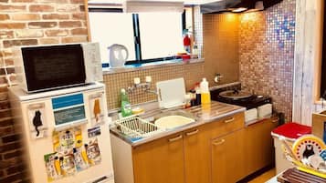 Appartement | Coin cuisine privé | Réfrigérateur, micro-ondes, four, plaque de cuisson