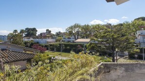 A residential area with houses, trees, and a clear sky. - M051 - Marcelli, villa with garden 200 meters from the sea (Marcelli)