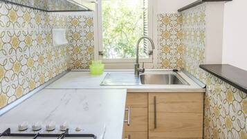 Fridge, oven, dining tables