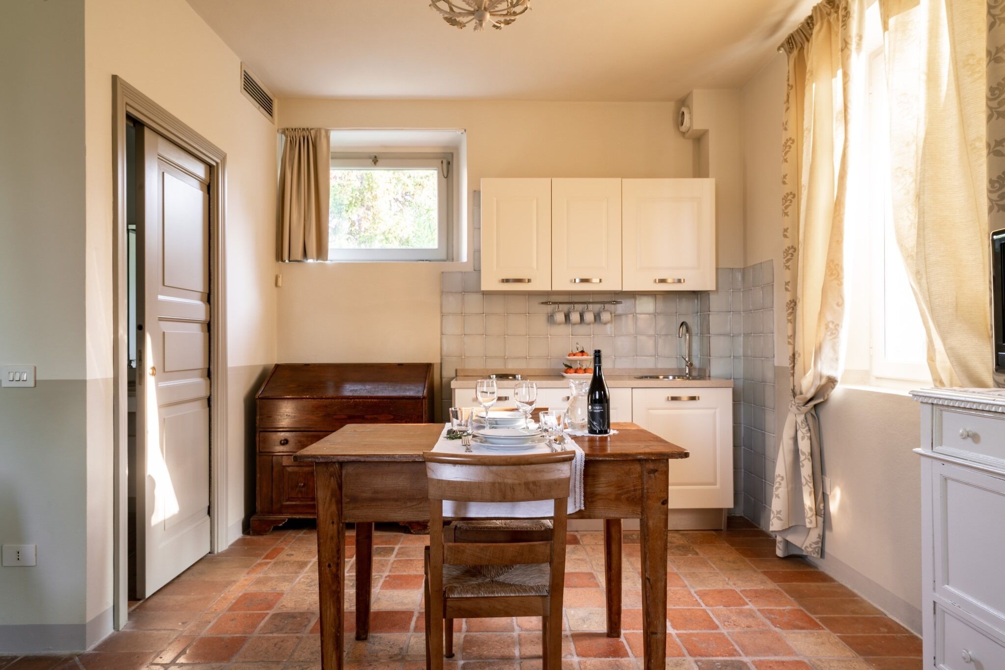 On the ground floor of an old farmhouse, in the countryside with swimming pool