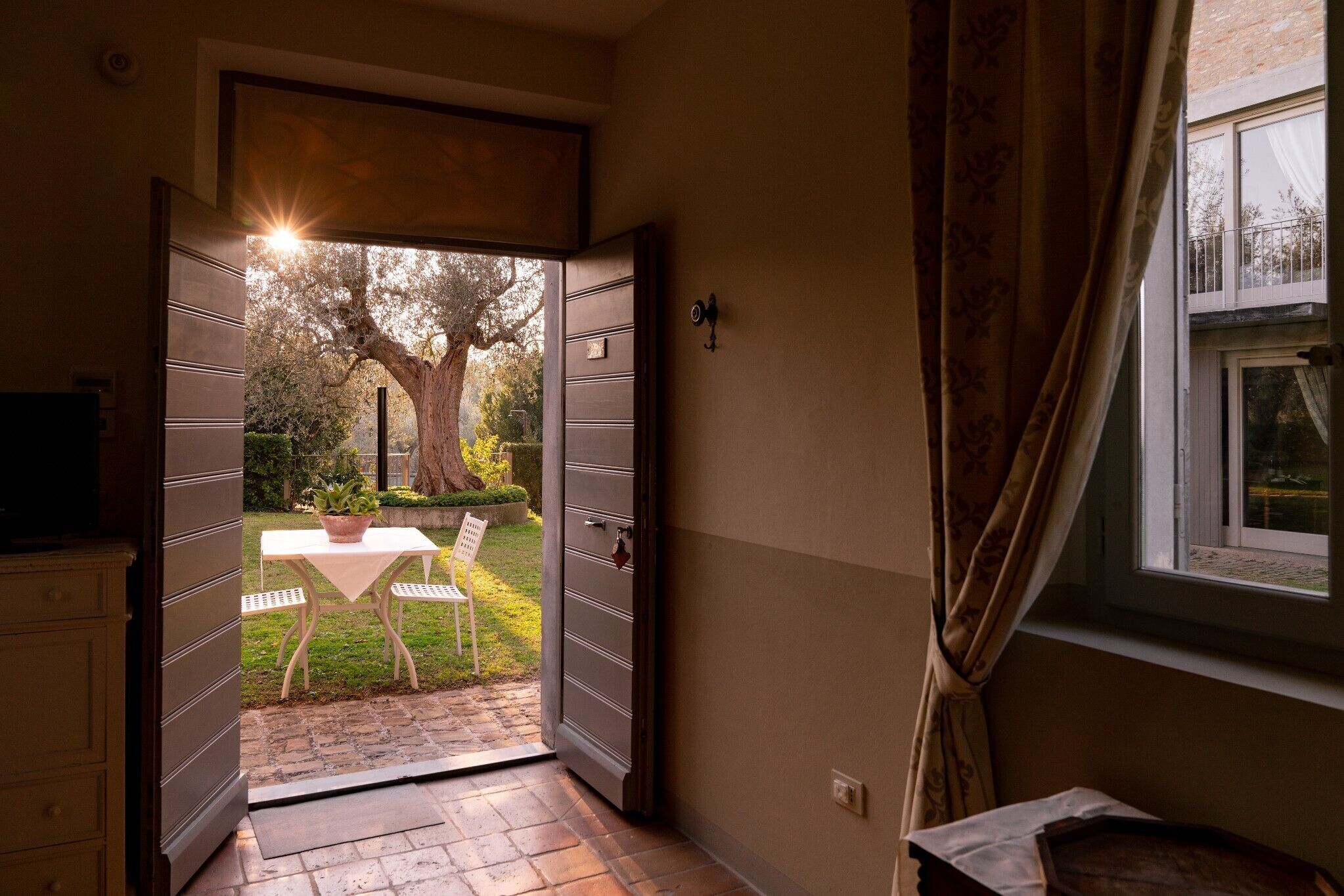 On the ground floor of an old farmhouse, in the countryside with swimming pool
