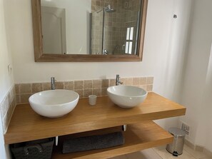Combined shower/tub, hair dryer, towels, toilet paper