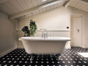 Bathtub, hair dryer, towels