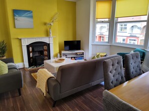 Smart TV, fireplace, DVD player, books