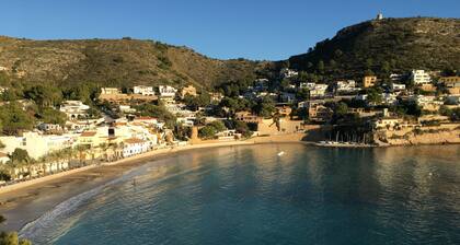 Detached 2 Bedroom Villa in El Portet, with large terraces and pool views