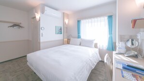 A hotel room with a large bed, a desk with a telephone and a mirror, a window with curtains, and an air conditioning unit. - Toyoko Inn Seoul Dongdaemun No.2 (Seoul)