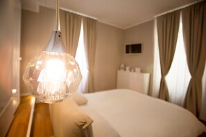 1 dormitorio, sistema de insonorización, tabla de planchar con plancha