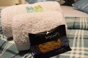 Bathtub, hair dryer, towels, soap
