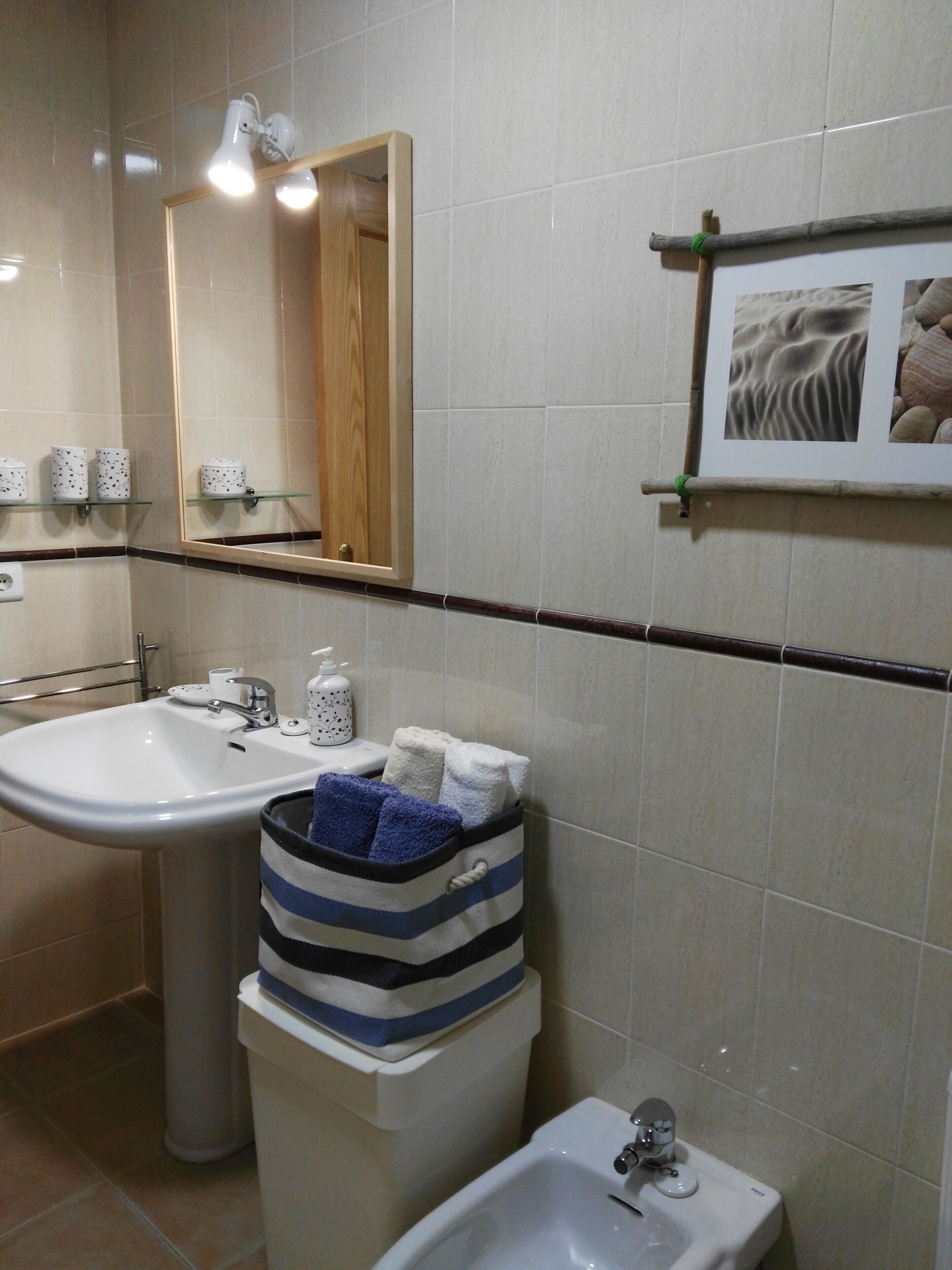 Secador de pelo y toallas