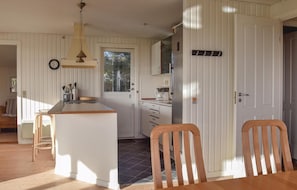 Fridge, stovetop, dishwasher, coffee/tea maker
