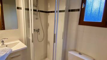 Shower, towels, toilet paper