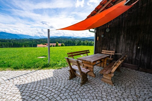 Former. Mountain farm on a sunny southern slope with a beautiful mountain view, secluded location