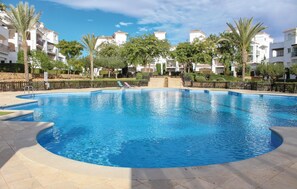 Outdoor pool - 2 bedroom nice apartment in Roldan (Roldan)