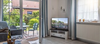 Cosiness and pure relaxation: The semi-detached house with a beautiful terrace offers