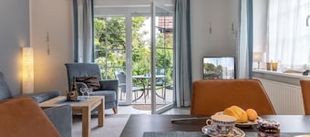 Cosiness and pure relaxation: The semi-detached house with a beautiful terrace offers