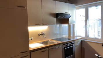 Fridge, oven, dishwasher, high chair