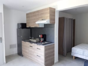 Fridge, microwave, coffee/tea maker, toaster