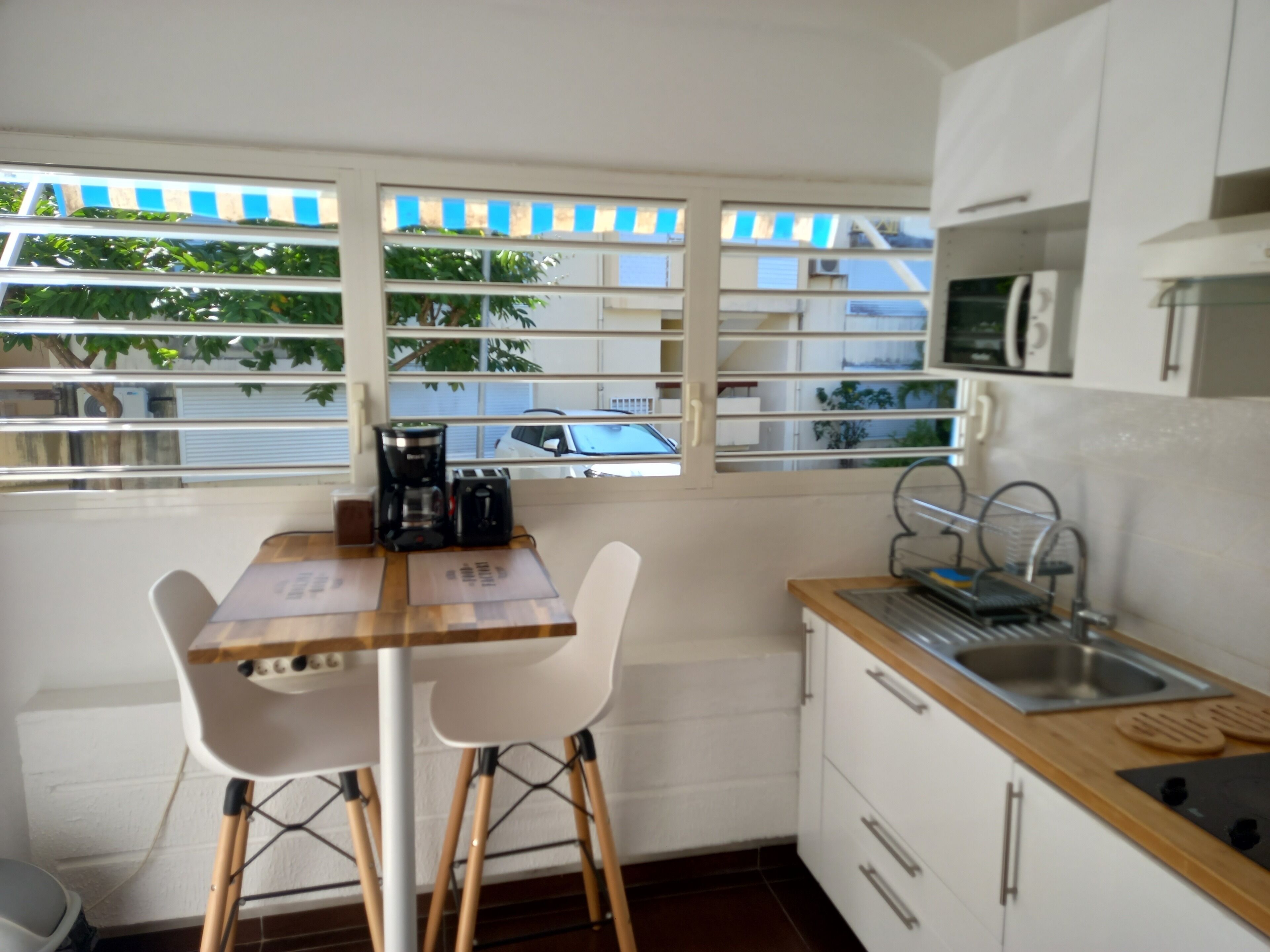 Microwave, stovetop, coffee/tea maker, toaster